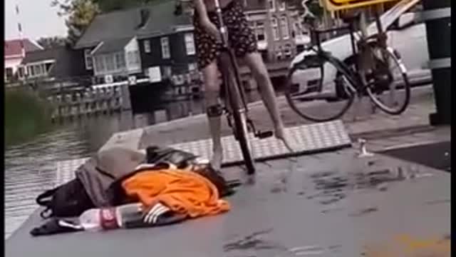 Bicycle dock slip and goes face first into water fail