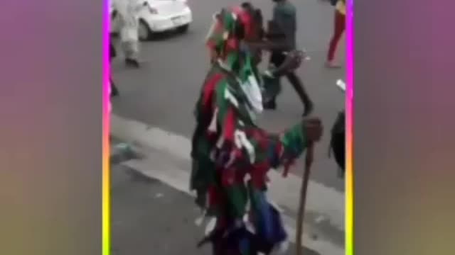 Dopey man dancing in the city