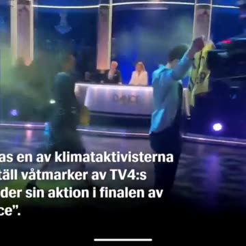 Climate Protestors Get Knocked Out By Camera After Storming Stage