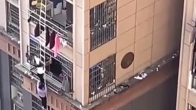 Shanghai residents are fleeing from apartments by rope ladders