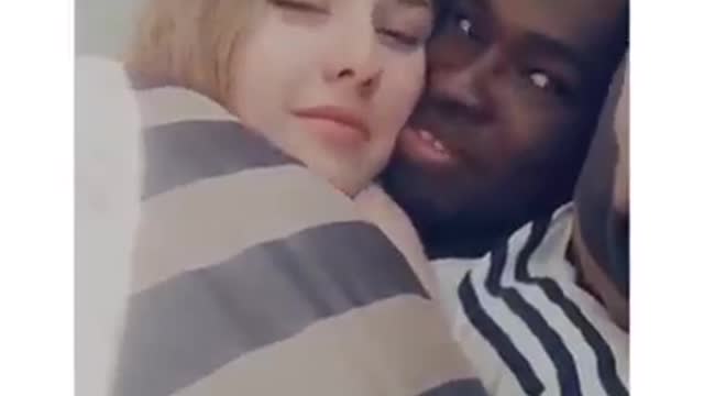 Black and white / lucky man kissing beautiful woman