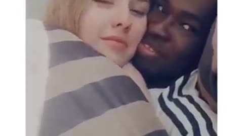 Black and white / lucky man kissing beautiful woman