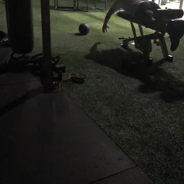 Man pretends to swim on bench press