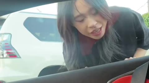 My spoiled sister doesnt know how to open mclaren doors