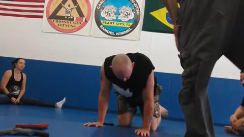 Grappling with a knife self-defense