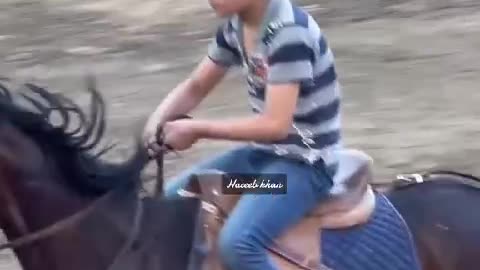 horse riding by smart boy