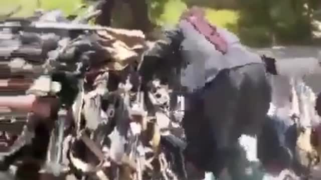 Footage of a weapons cache seized by Taliban in recently captured Sheberghan city.