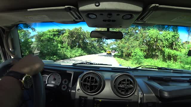 Beautiful places of the Dominican Republic, I'm driving a powerful car