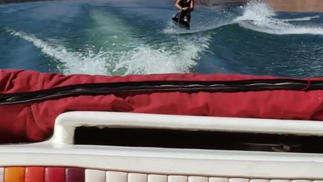 Man in black jet ski on