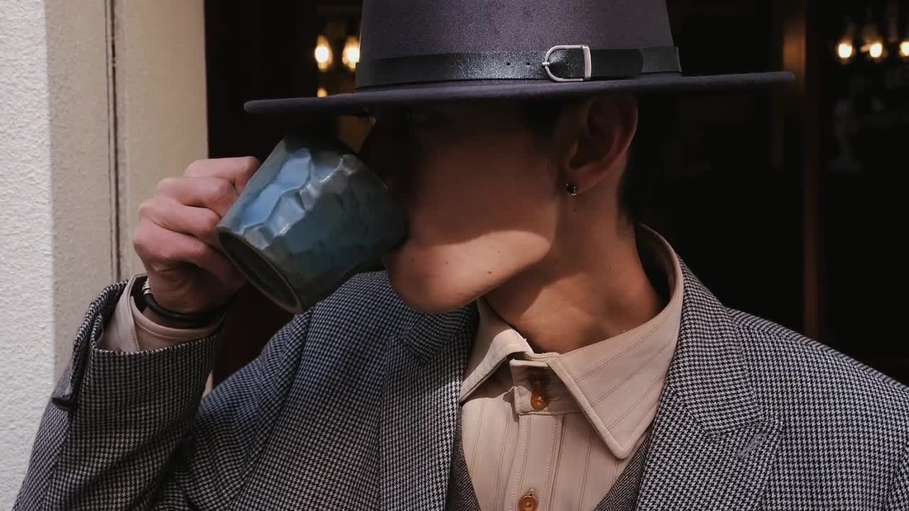 Handsome guy drinking coffee