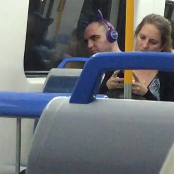 Purple head phones with alien ears on top