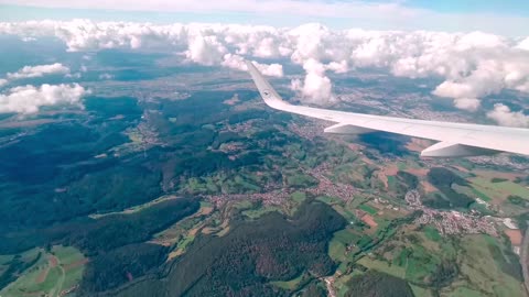 viewo fairplane wing above clouds