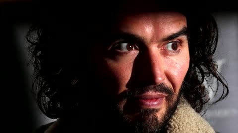 Russell Brand rails against media, government as police launch probe