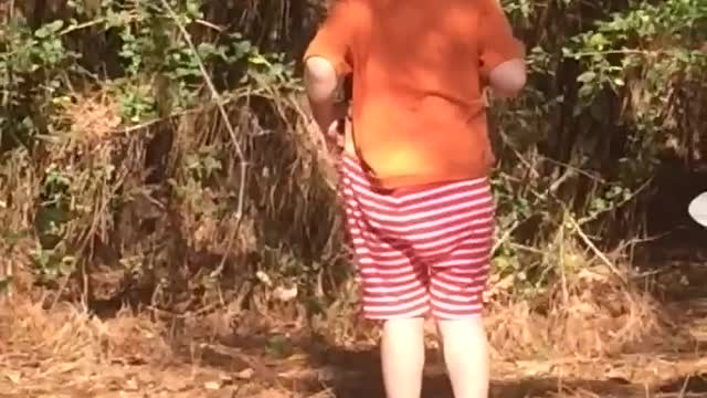 2 year old puts sticks in his pants