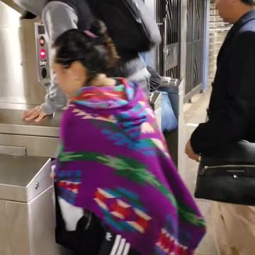 People jumping over subway pay station