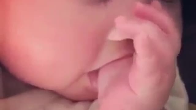 Cute Baby Sucking Thumb