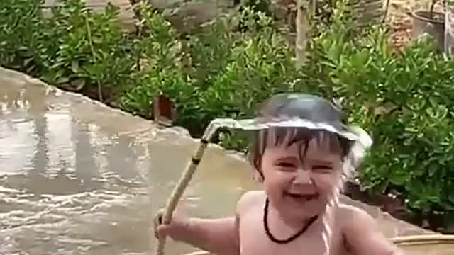 cute baby bathing