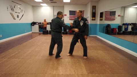 Correcting common errors executing the American Kenpo technique Delayed Sword