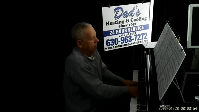 Don Burton playing the piano, original composition "Morning Groove"