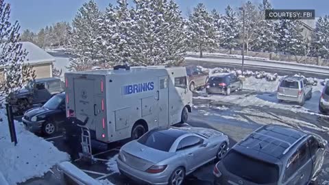 RAW _ Suspects caught on video robbing armored vehicle with AK-47 and handguns