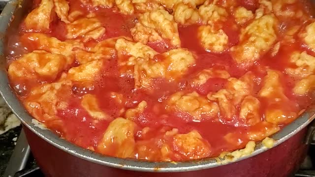 Making mama's tomatoes and dumplings