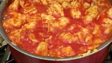 Making mama's tomatoes and dumplings