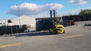 RAISE THOSE CHASSIS HIGH: BUSY FORKLIFT OPERATOR