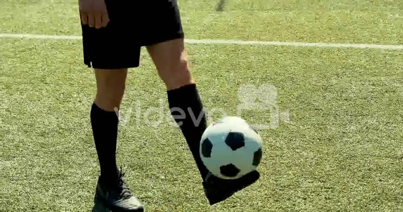 Close Up Of An Unrecognizable Soccer Player Training Freestyle Tricks With The Ball On A Street Foot