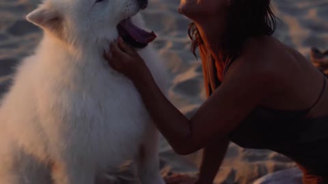 Young Woman Petting a Dog