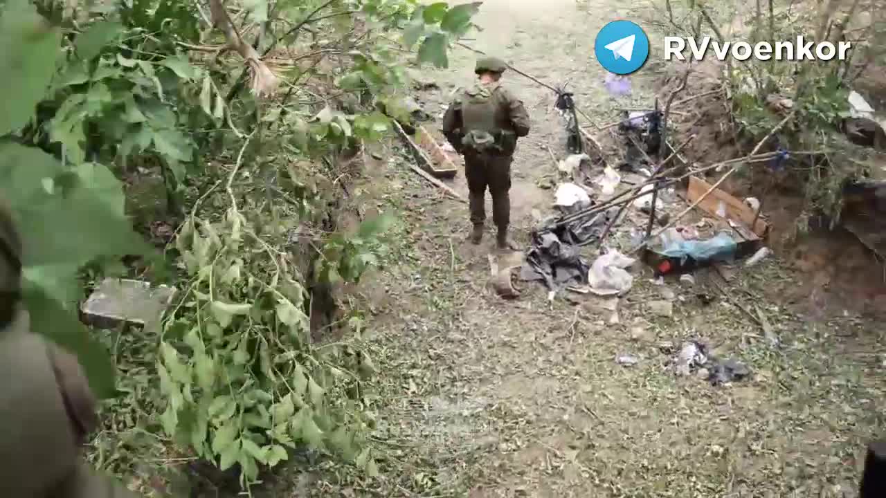 Russian soldiers captured Ukrainian trench equipment