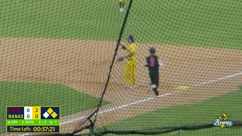 Baseball Player Pitches in Stilts