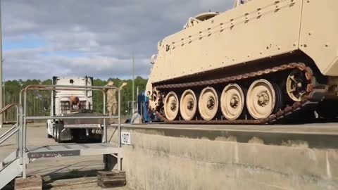 _U.S. armored personnel carriers prepared for shipment to Ukraine_.