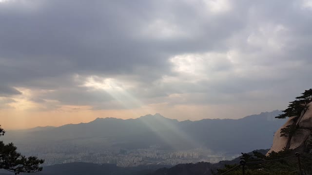 Light and clouds in the sky.