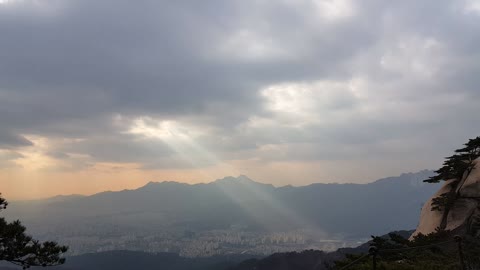 Light and clouds in the sky.