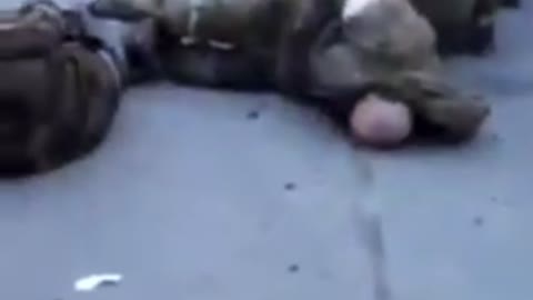 Graphic: 18+. Ukrainian troops torturing and shooting Russian POW.