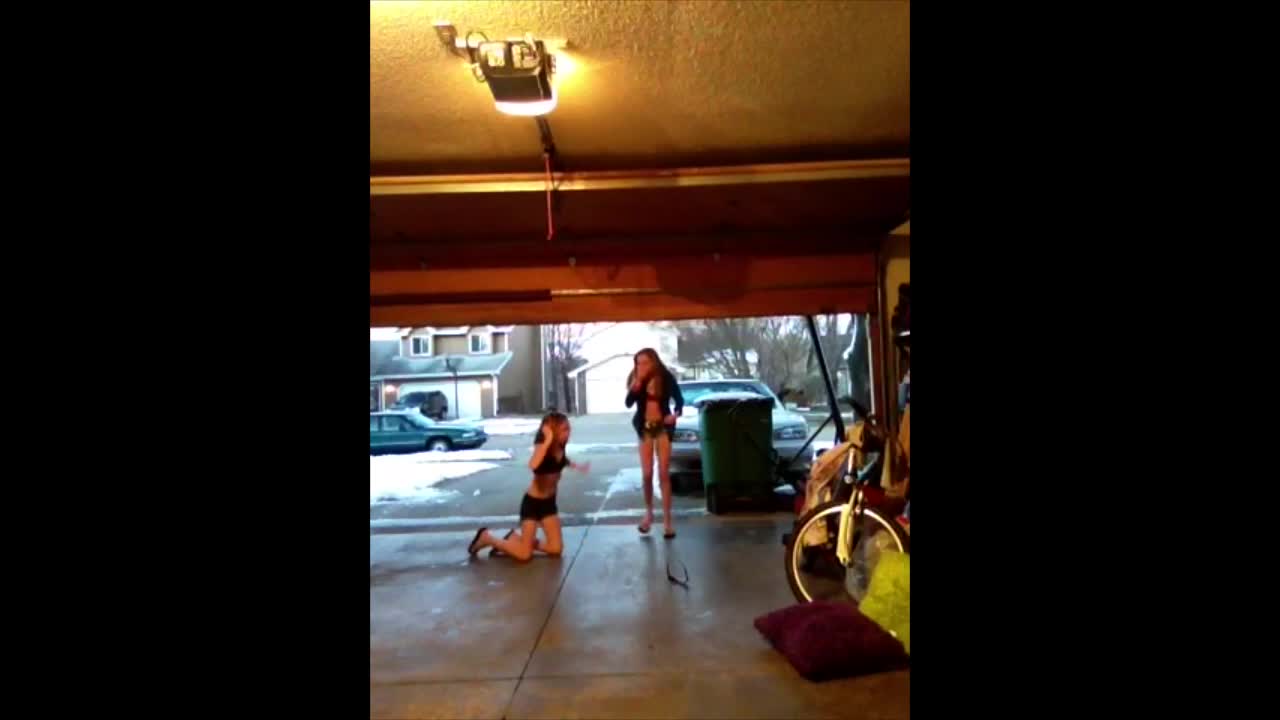 Girl Runs Face First Into Closing Garage Door