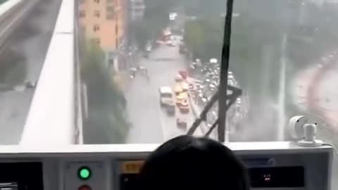 Train passing through a residential building in China