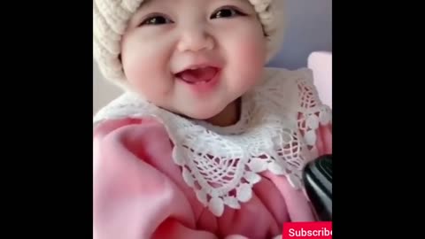 Small baby playing with cute smile