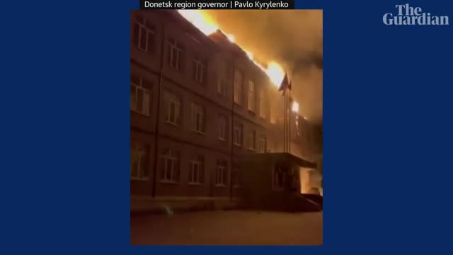 Ukrainian school engulfed in flames after being hit by Russian shelling