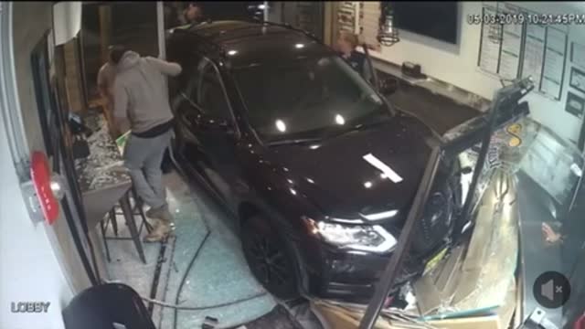 Woman Crashes Into Store