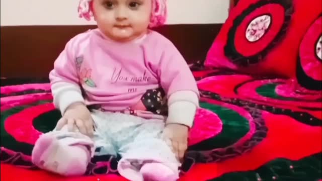 Cute baby in bedroom