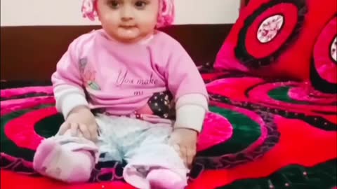 Cute baby in bedroom