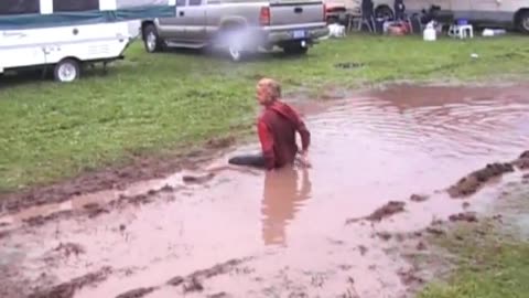 Woman thrown into mud! 