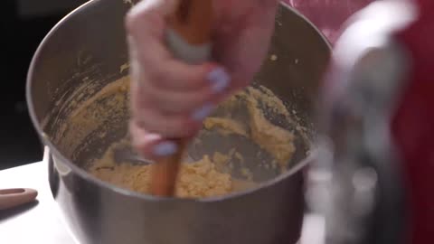 Mixing milk and dough together