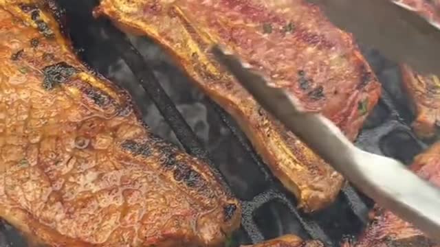 Grilled Beef Short Ribs bbq sizzling action.