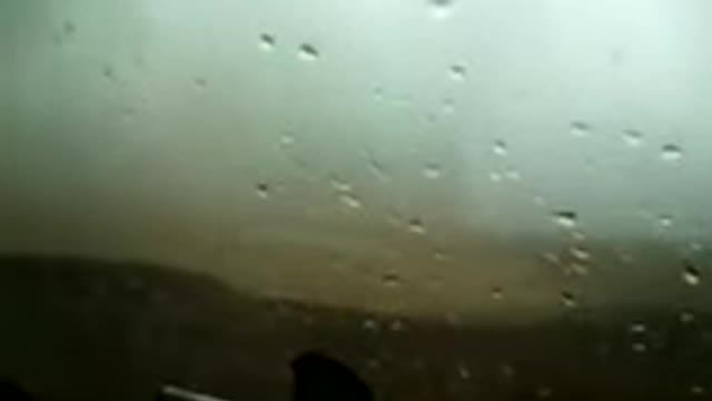 An outback Australian scary hailstorm 'whiteout' wildly shaking my car