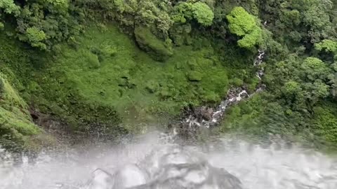 Would you sit this close to the edge of the tallest waterfall in Colombia? 😳