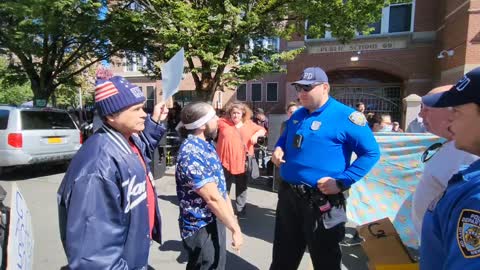 In Queens NY , a Drag Queen story hour was taking place. Protesters disrupt the story hour.