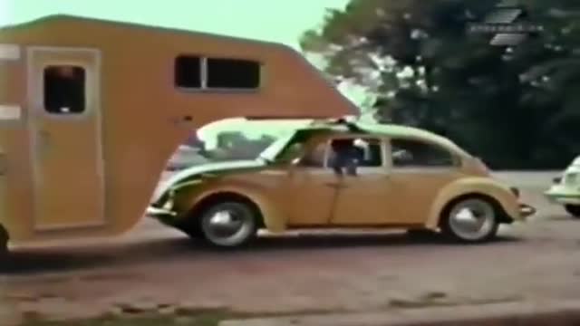 A 1974 Volkswagen and it's Fifth-Wheel travel trailer.