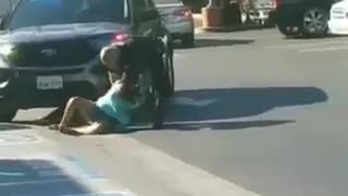 Blue jeep drives through crowd of protesters in Aurora